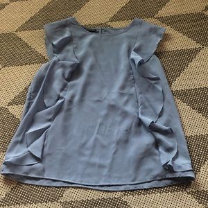 Woman’s blue shirt